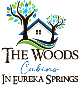 The Woods Cabins in Eureka Springs logo